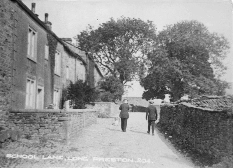 School Lane.jpg - School Lane   ( Date not known - but possibly a few years after the previous image, as the ivy on the house at left is higher  and the mens' suits look a more recent style. ) .